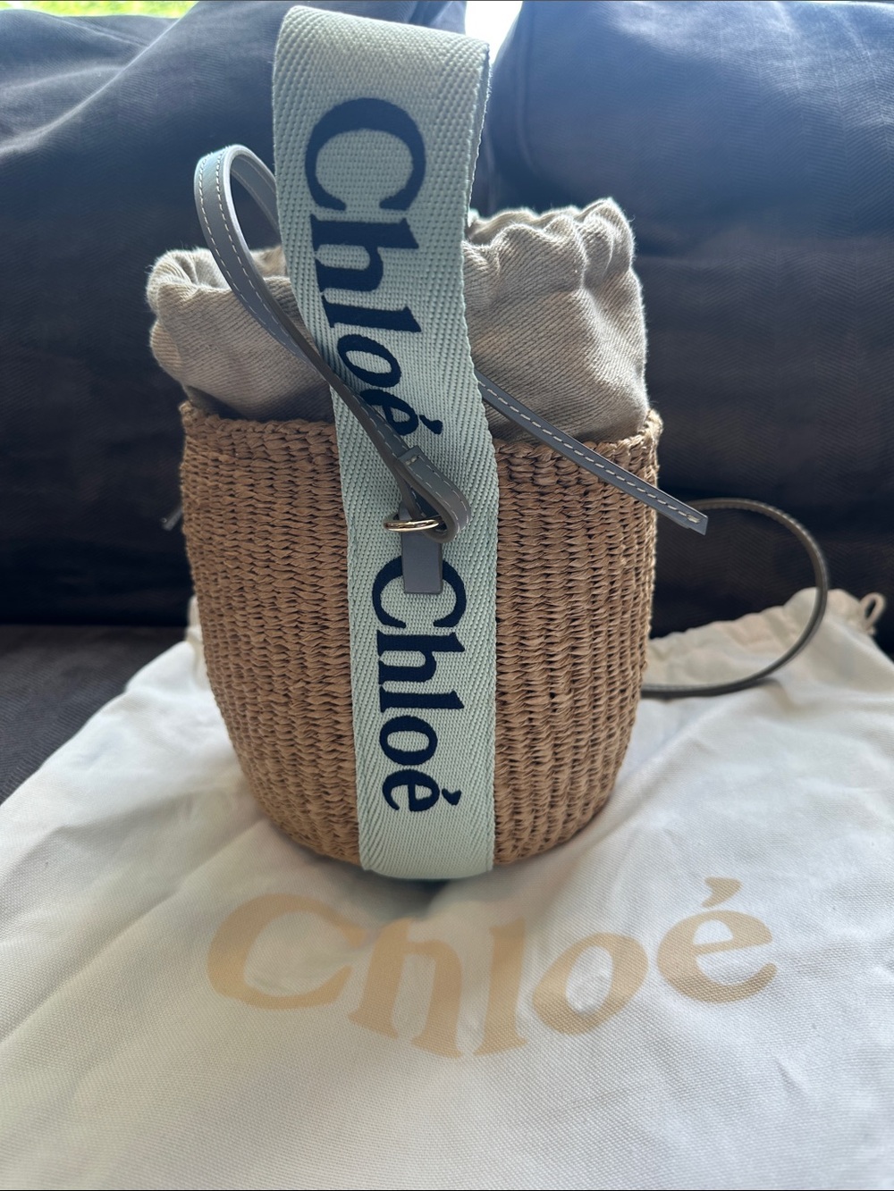 Chloe small Natural Straw Bucket Bag with Light Blue Logo Strap